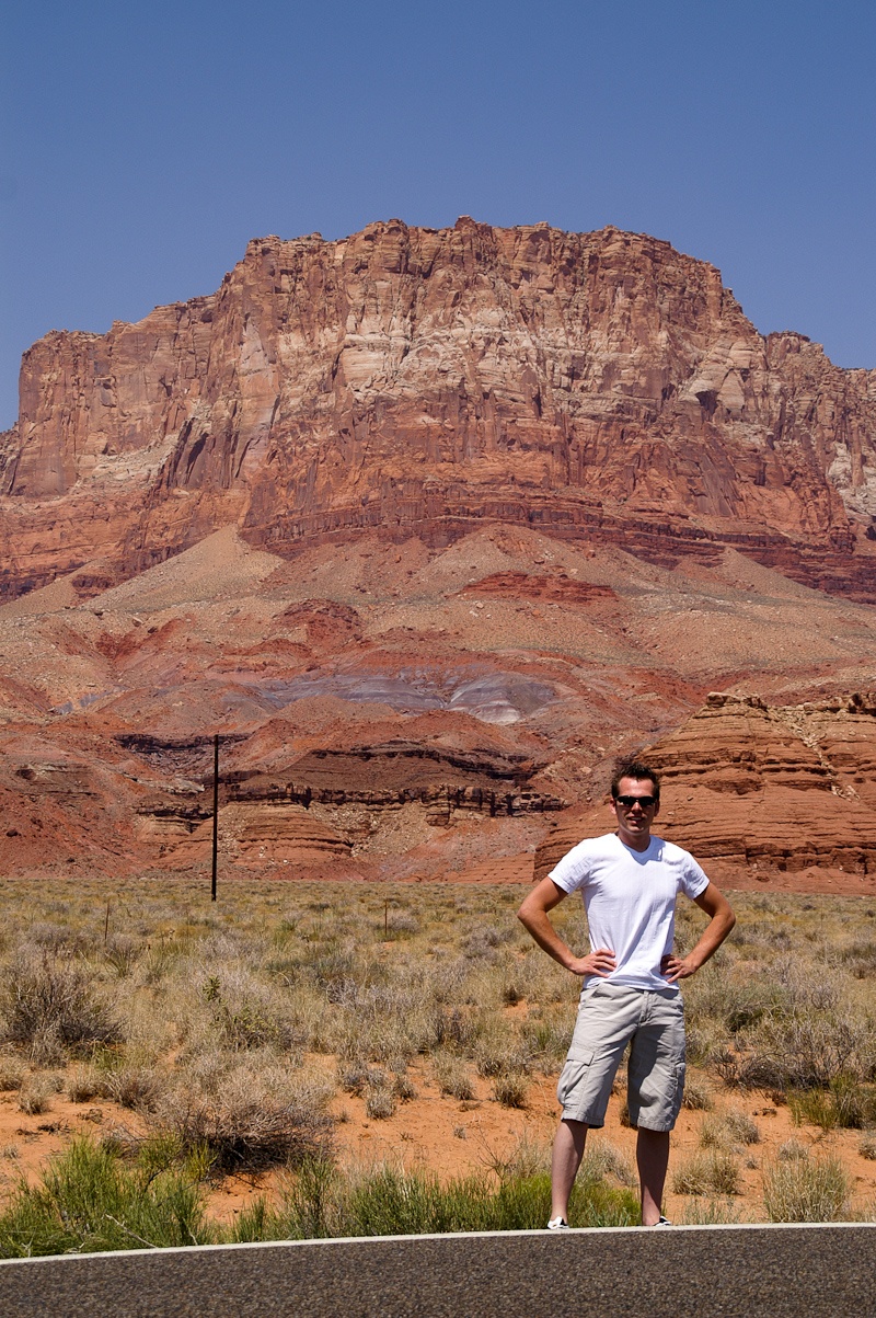 In front of a very big rock