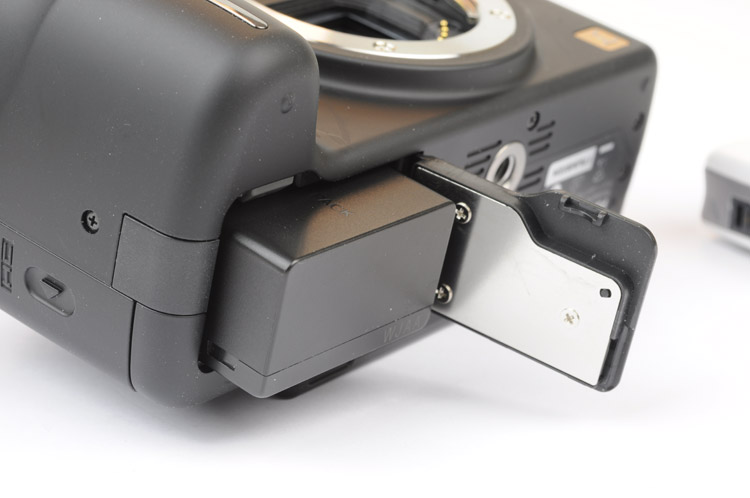 Panasonic Lumix G1 behuizing batterijcompartiment