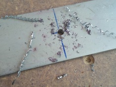 gat boren met rvs krullen