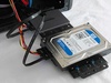 Detail montageframe SSD laag hard disk hoog aan kast