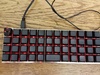 Planck met zwarte DSA keycaps en HotKeysProjects Artisan