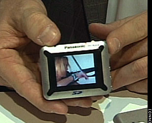 Panasonic SD-VM1 e-wear SD Viewer - The Panasonic SD-VM1 e-wear SD Viewer connects to television, allowing users to record TV shows for watching on the go. This MPEG4 and JPEG player has a 1.8-inch color display.