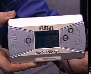 RCA Lyra Jukebox, Model RD2800 - RCA's Lyra Jukebox features a 10GB hard disk drive big enough to hold thousands of songs as well as computer files and digital images. Compatible with both PC and Mac, it will be available in late spring for around $300.