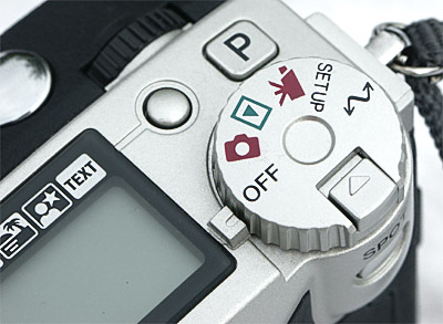 Dimage 7i review: Dimage 7i knoppen bovenkant body