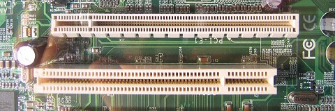CeBIT 2004: detailshot PCI Express- + PCI-slot