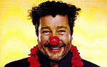 Portret Philippe Starck met clownsneus