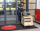 Kees met wat gereedschap en de nieuwe swiches en Aeolus in doos