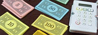 monopoliegeld en rekenmachine