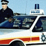 Britse politieagent en -auto