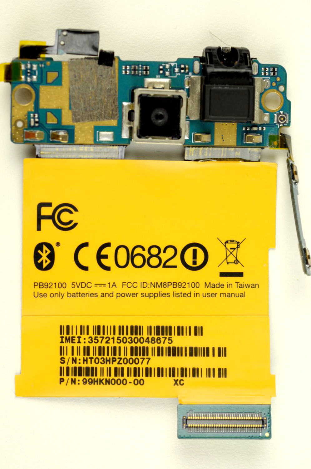 HTC HD Mini: minder groot, minder smartphone - De binnenkant: geel en ...