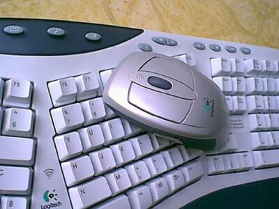 Logitech Cordless iTouch Keyboard & Mouse 