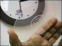 FMD-ROM schijfje in hand
