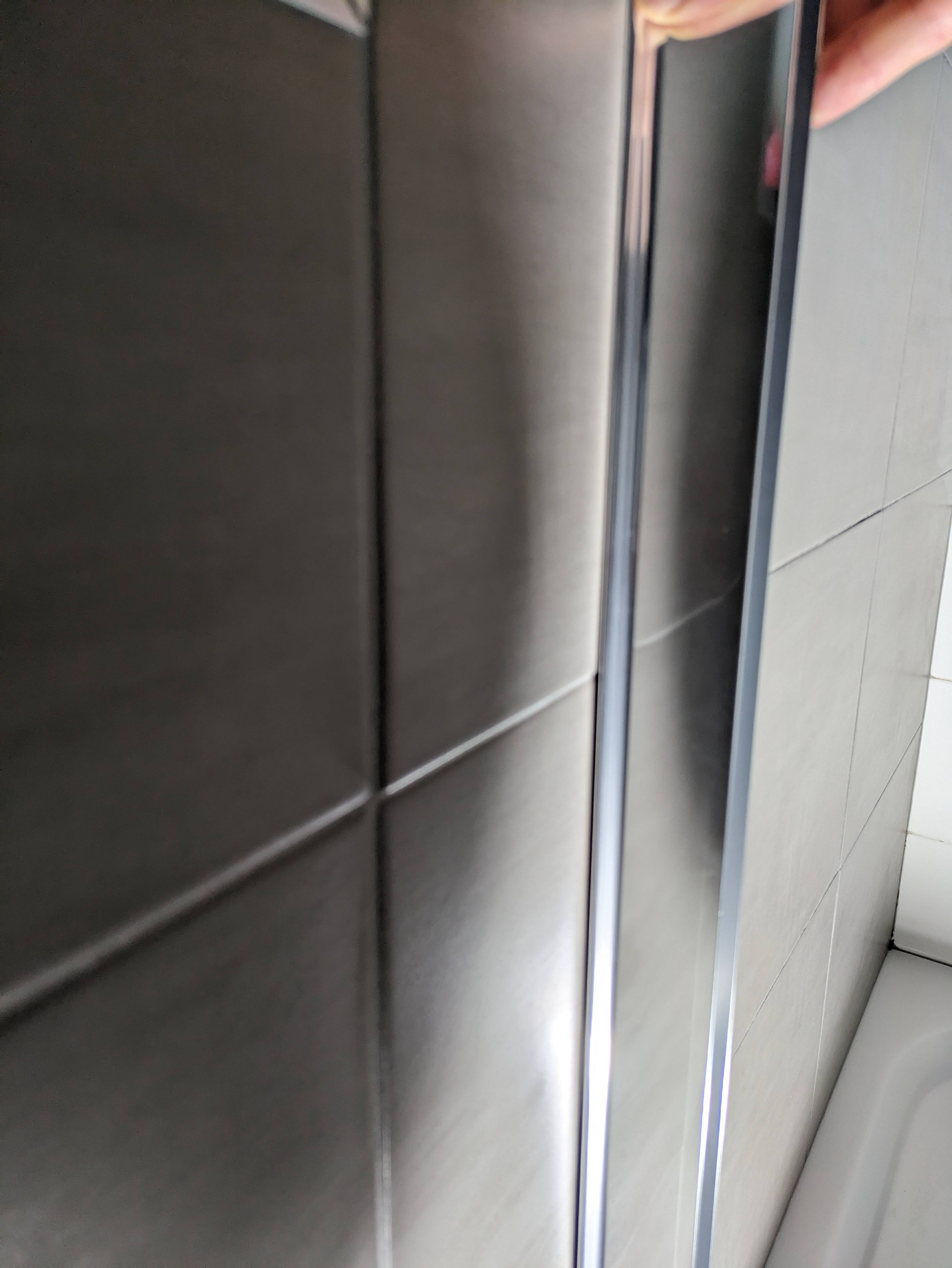 douchecabine vervangen, muur niet vlak betegeld. Bouwen en klussen GoT