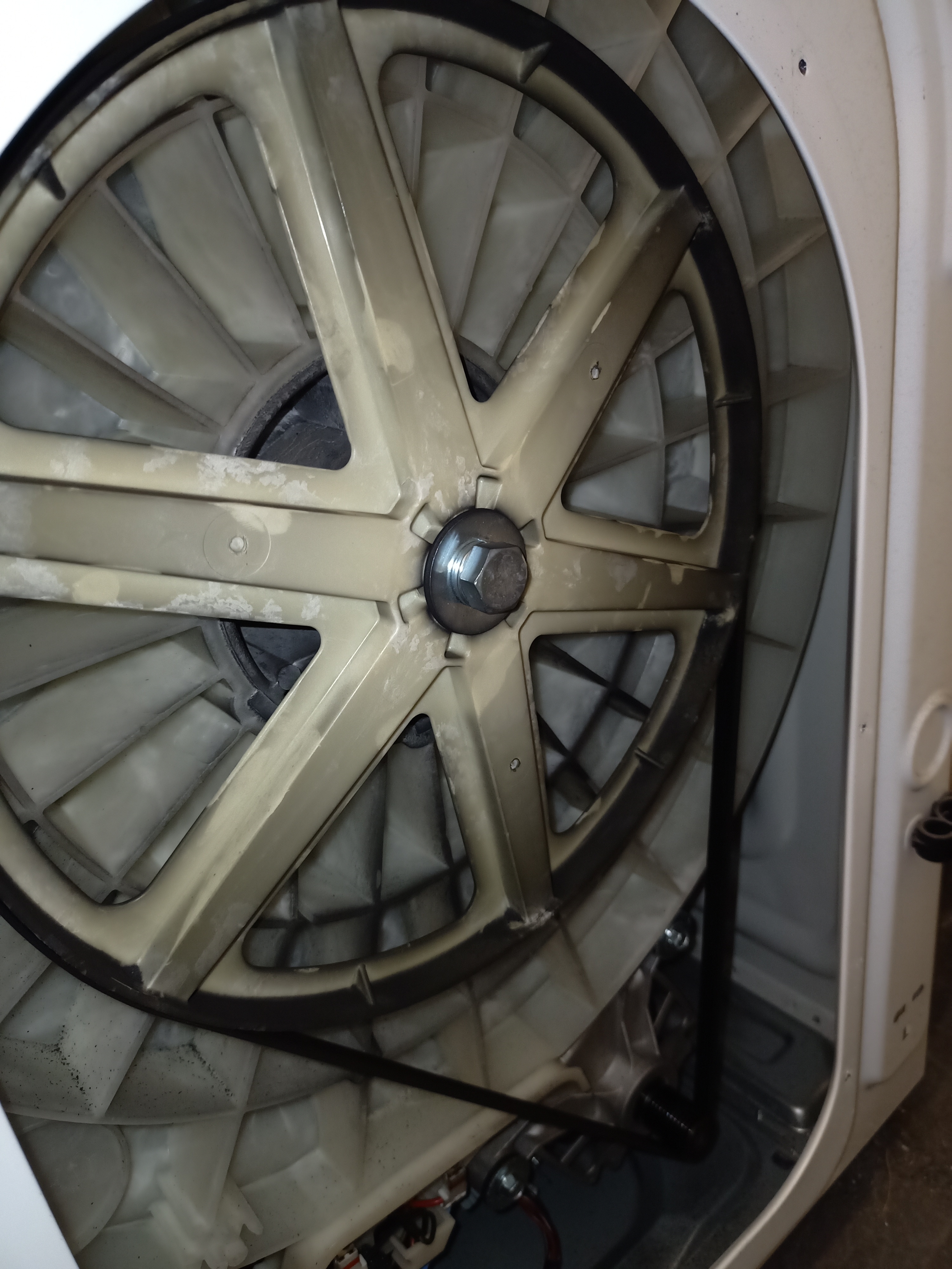 wasmachine verbrande geur