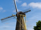 Nabewerkte foto's buiten accordion - compactcamera vs. smartphone