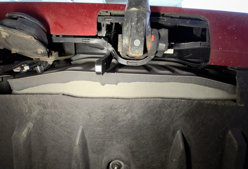 Onderkant achterbumper van Toyota Corolla Hybrid TS 2022 met verwijderbare trekhaak.