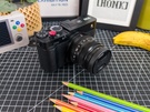 Nabewerkte foto's buiten accordion - compactcamera vs. smartphone